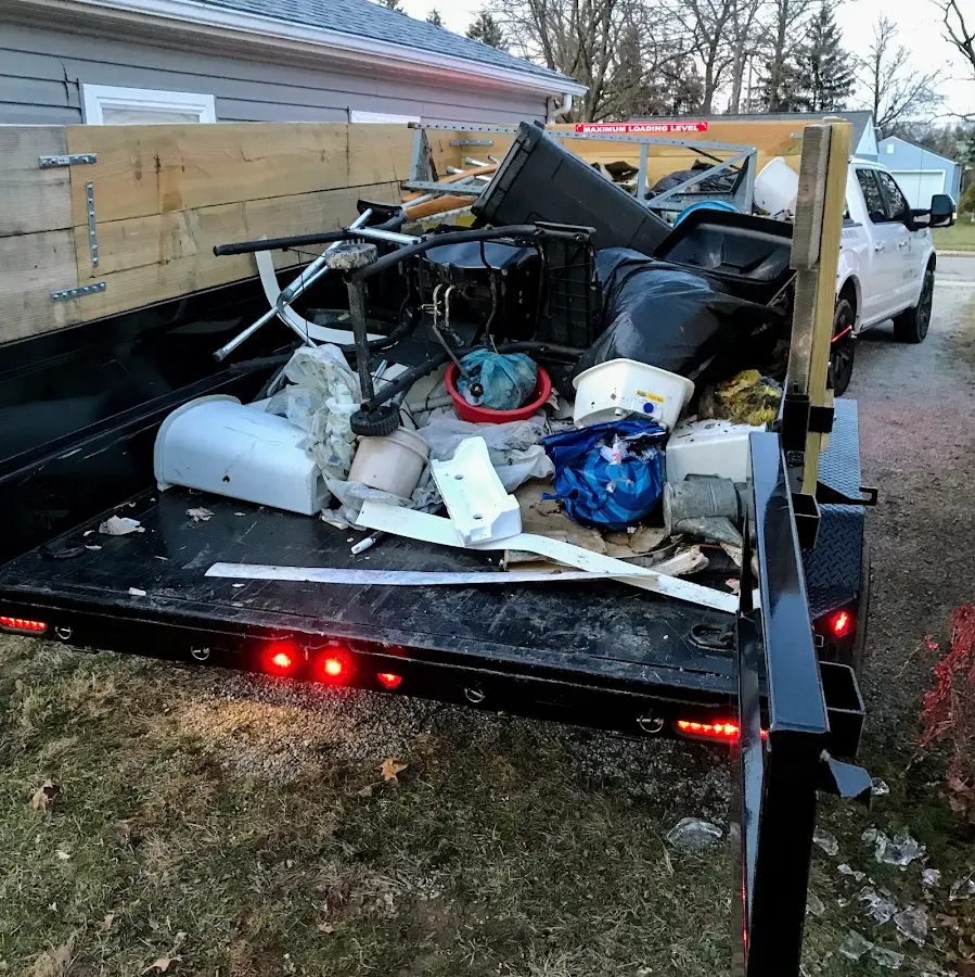 Roll-off dumpster delivered to a residential driveway in Fairland